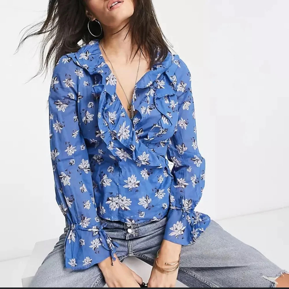 Free People Amanda wrap top ruffle detail blouse in blue, size medium